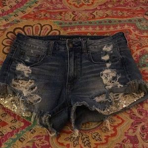 Distressed shorts with sequin pockets